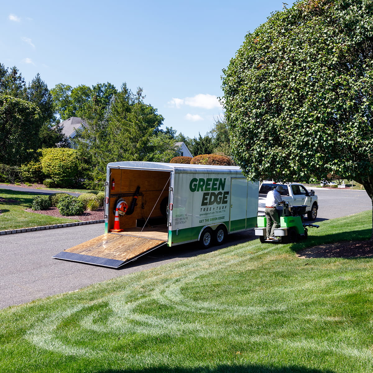 Lush green lawn with Green Edge's Ocean custom fertilization, weed control, and seeding programs.