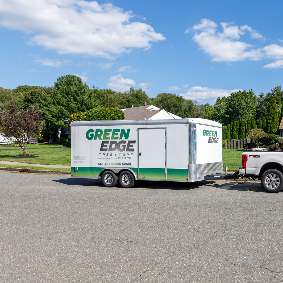 Lush green lawn with Green Edge's Wall Township custom fertilization, weed control, and seeding programs.